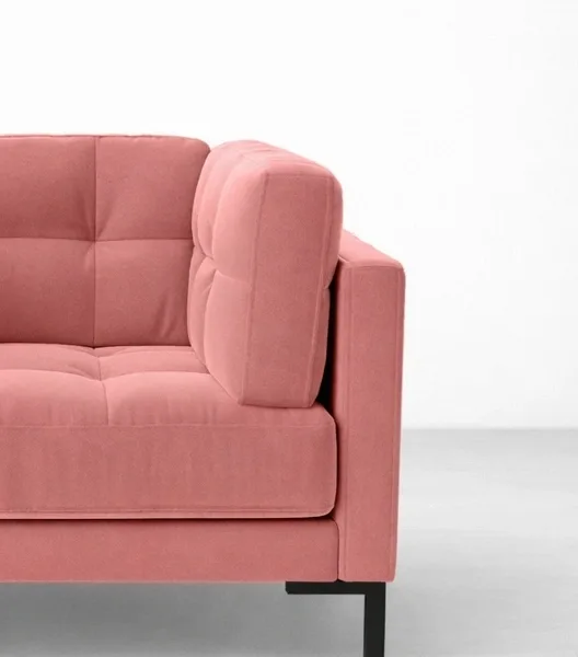 Pink velvet lounge chair close-up showing tufted upholstery and side bolster, INTERIORZE ROSELYN