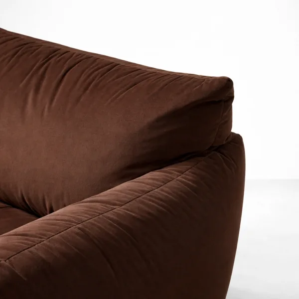 Close-up of INTERIORZE Cocoa Loft brown suede fabric 2 seater sofa showing soft suede-feel upholstery texture and seam detailing