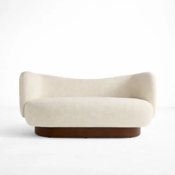 Ivory boucle 2 seater sofa front view with curved backrest and teakwood base by INTERIORZE Luna