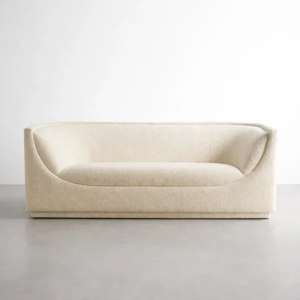 Front view of INTERIORZE Arcline ivory boucle 2 seater sofa showing curved arms, deep seat, and minimal base