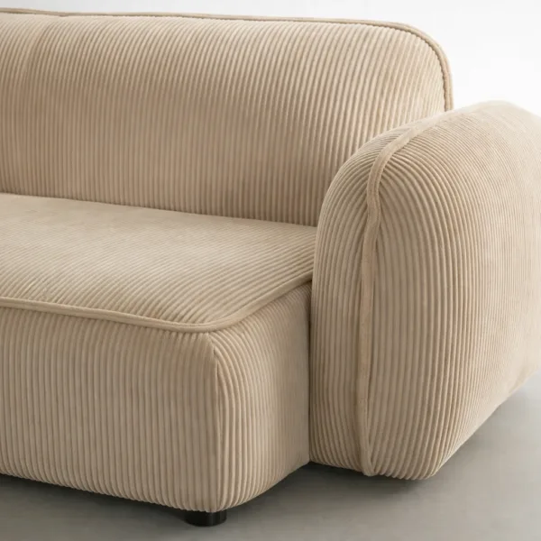 Close-up of INTERIORZE Ridge beige corduroy 2 seater sofa showing ribbed upholstery texture and rounded arm