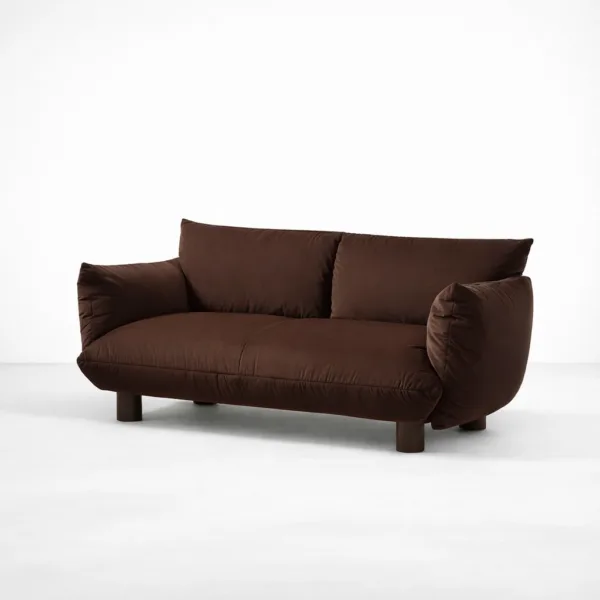 Angled view of INTERIORZE Cocoa Loft brown suede fabric 2 seater sofa showing deep seat, soft back cushions, and rounded arms