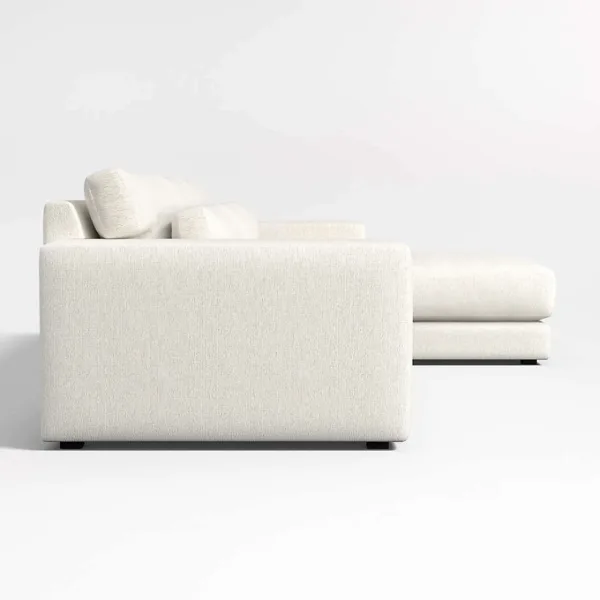 Ivory sectional sofa with right chaise and teakwood base side view