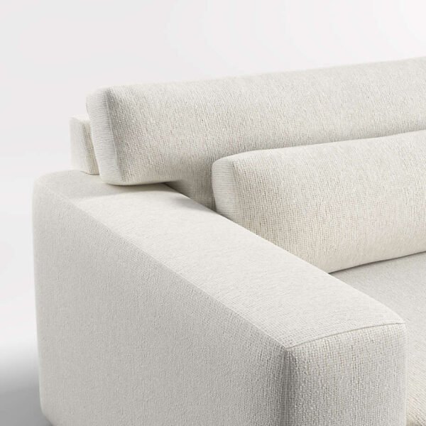 Ivory textured upholstery and armrest detail on Retreat sectional sofa