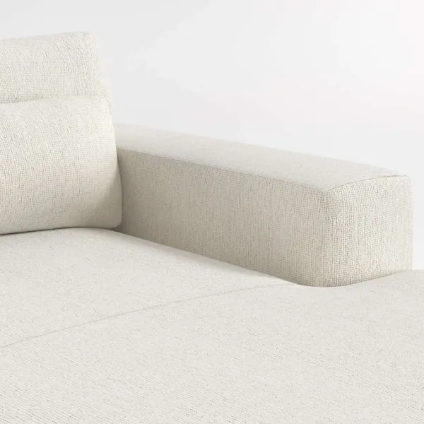 Cushion and upholstery texture detail of ivory L shape sectional sofa