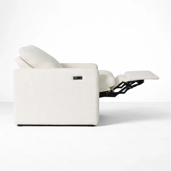 Motorized recliner chair fully reclined with footrest extended in ivory fabric