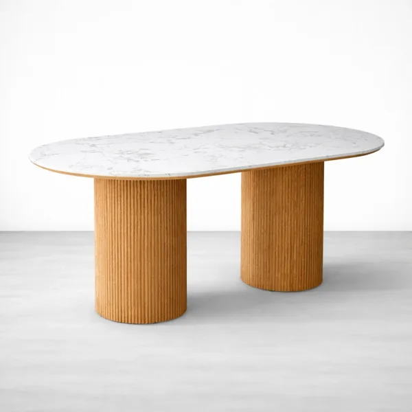 Angled view of white marble top fluted teakwood dining table