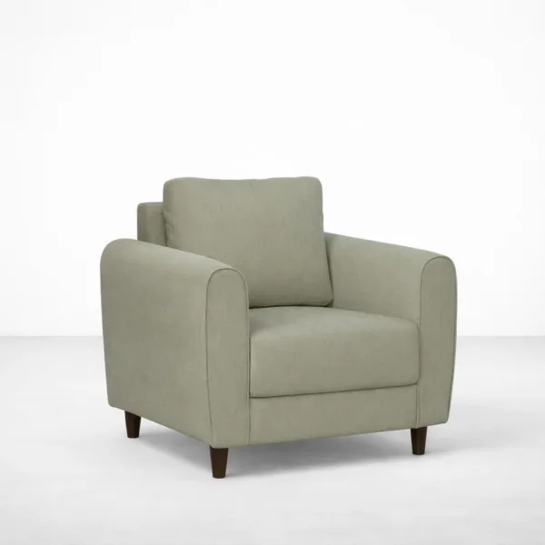 Sage green armchair with teakwood legs angled view, INTERIORZE ELM.