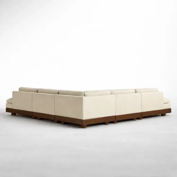 Back view of modular L-shape sectional sofa in ivory fabric with teakwood base