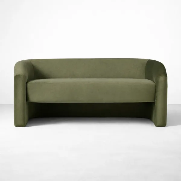 Front view of INTERIORZE Olive Arc olive green velvet 2 seater sofa with wrap-around back and floating seat profile