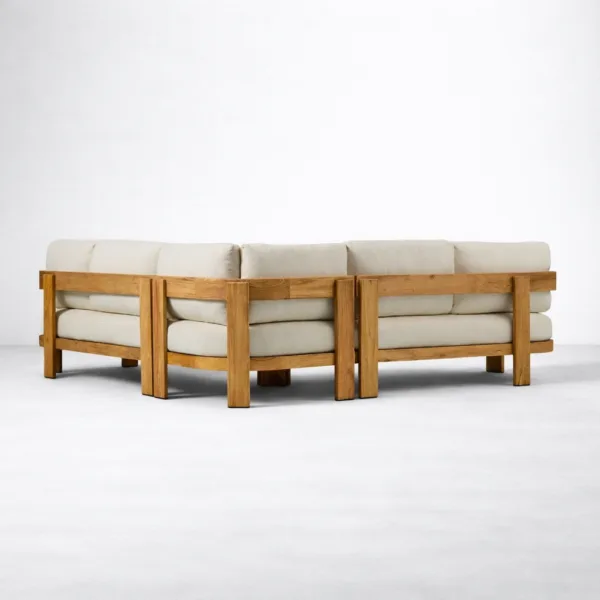 Back view of teakwood L shape sectional sofa showing solid teak frame and cushions