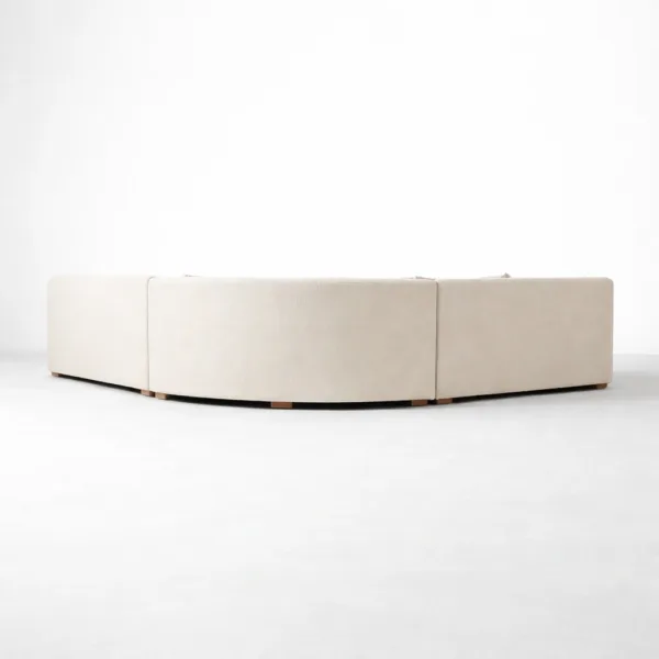curved sectional sofa back view off-white bouclé with teak base