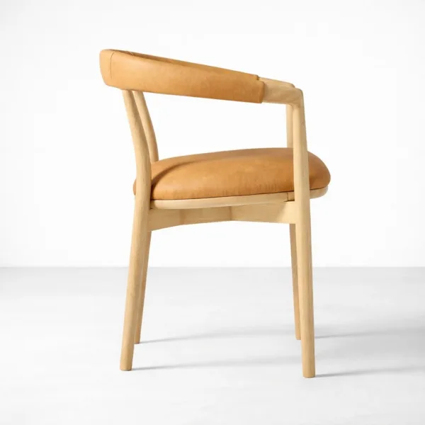 Teakwood upholstered dining chair natural wood frame tan seat side view