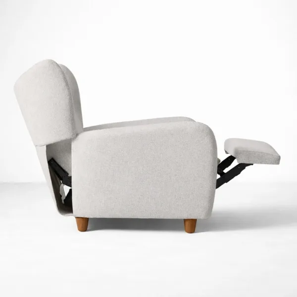 Wingback recliner chair reclined with footrest extended in cloud grey bouclé fabric