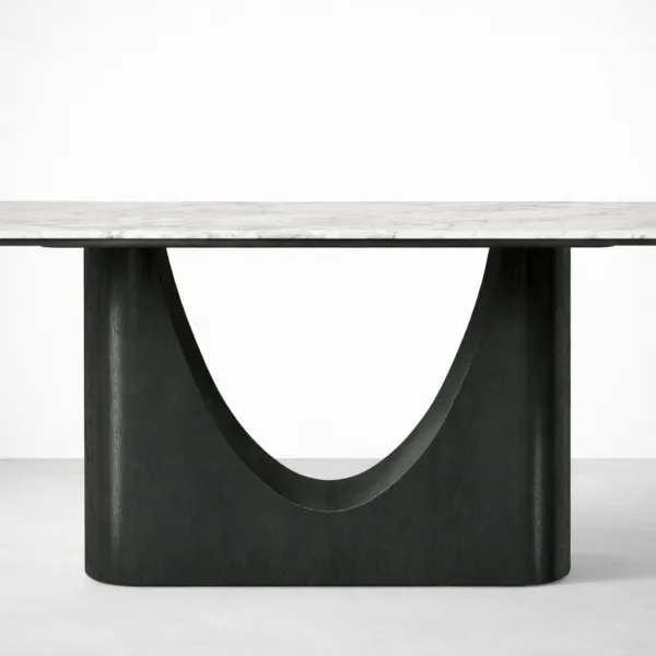 Angled view of Noira marble top teakwood dining table with arch base