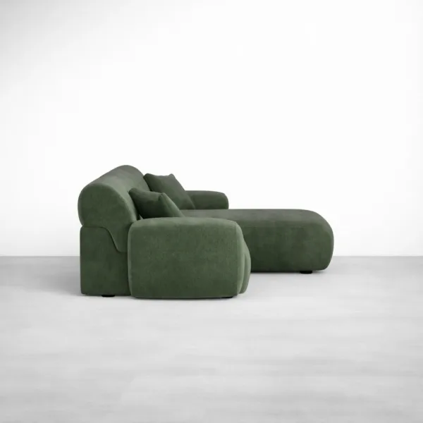 Side view of forest green chaise sofa showing deep lounging length