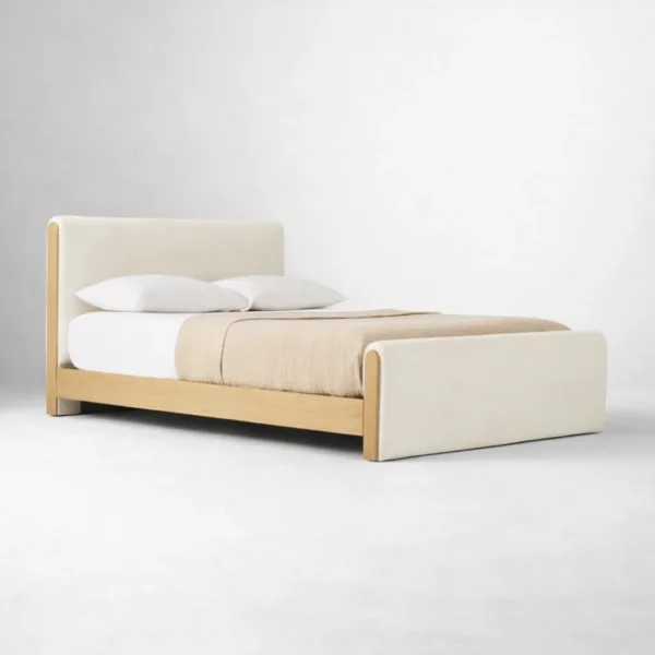 Upholstered teakwood bed with padded headboard and ivory upholstery by INTERIORZE