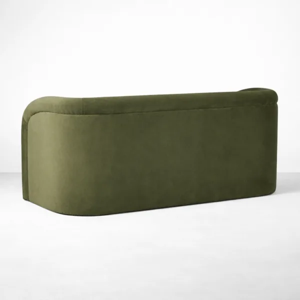 Back view of INTERIORZE Olive Arc olive green velvet 2 seater sofa showing a smooth upholstered rear panel and rounded corners