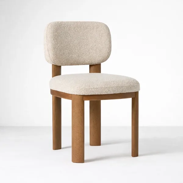 Bouclé dining chair ivory upholstery teak wood walnut finish angled view