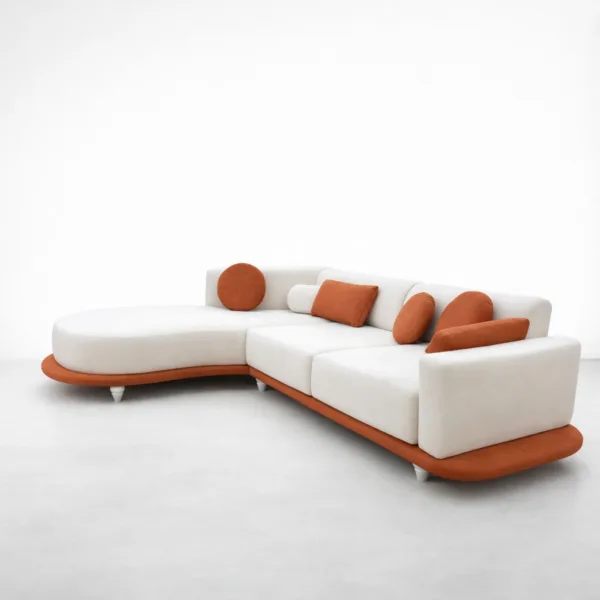 Modern curved chaise sectional sofa by INTERIORZE with off-white upholstery and rust orange accents