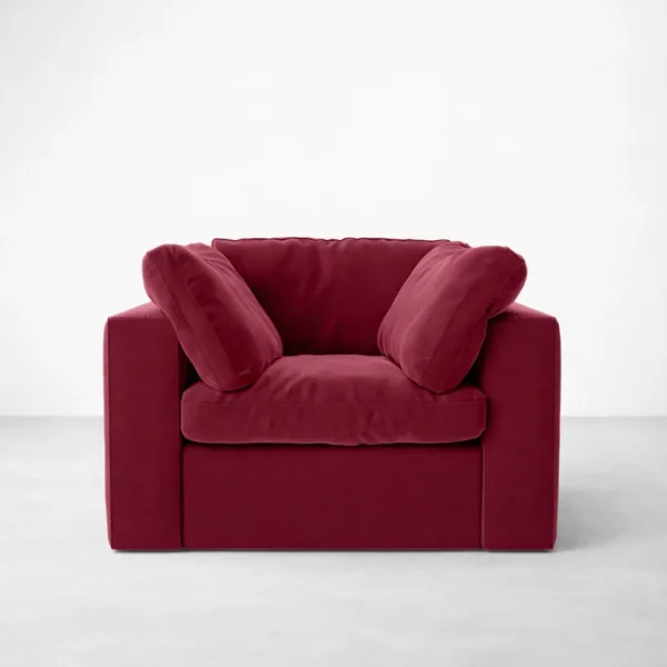 Rear angle view highlighting the boxy silhouette and deep burgundy velvet upholstery.