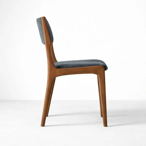 Solid teak wood dining chair with blue upholstered seat and back side view