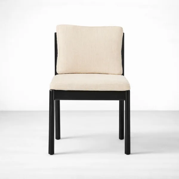 Beige upholstered dining chair with black teakwood frame front view INTERIORZE Mono