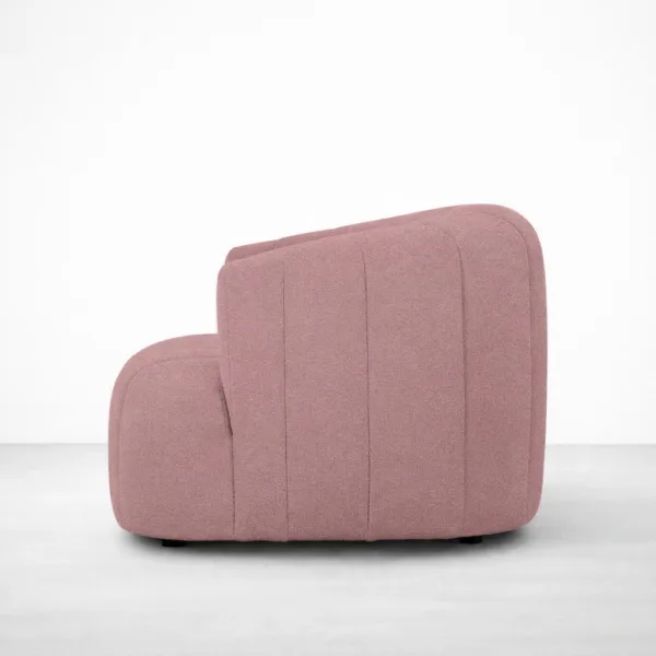 Blush boucle barrel chair side view with rounded back, INTERIORZE PETAL.