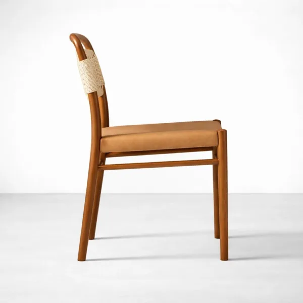 Cane back teakwood dining chair side profile with tan seat INTERIORZE Sirocco