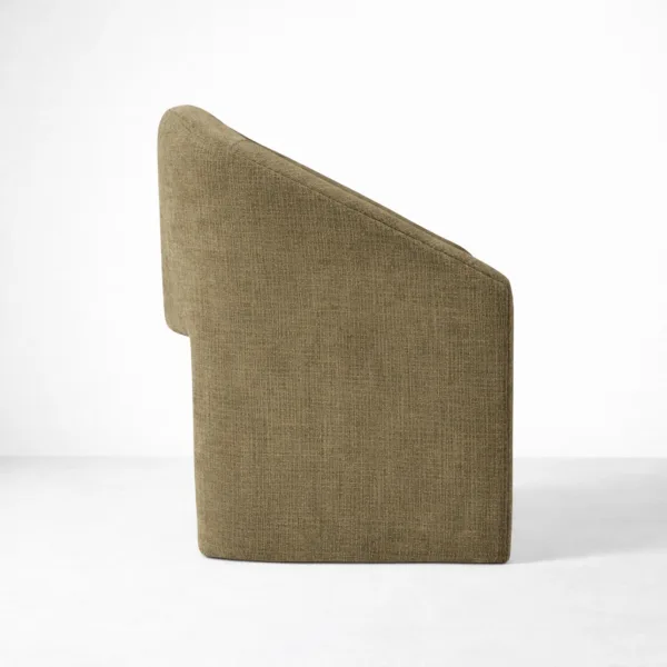 Side profile of olive upholstered accent chair with modern curved form