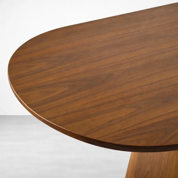 Teakwood grain detail on Nivora solid teakwood oval dining table top