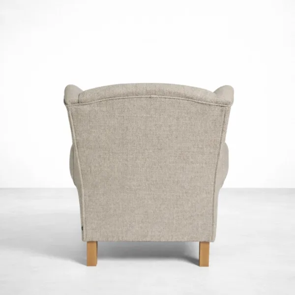 Beige wingback armchair with teakwood legs rear view, INTERIORZE HERITAGEWING.