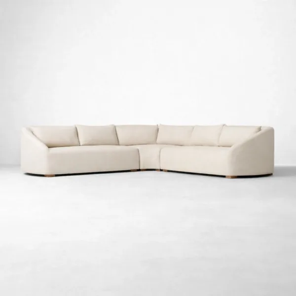 Curved ivory linen L shape sectional sofa front wide view by INTERIORZE