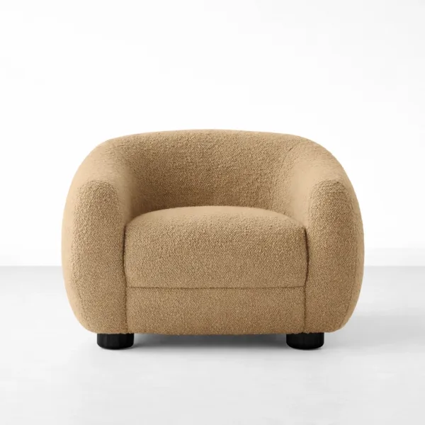 Beige boucle lounge chair with teakwood legs front view, INTERIORZE SANDDUNE.