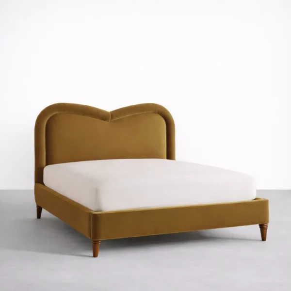 Mustard velvet upholstered bed with heartback headboard by INTERIORZE Aurelia