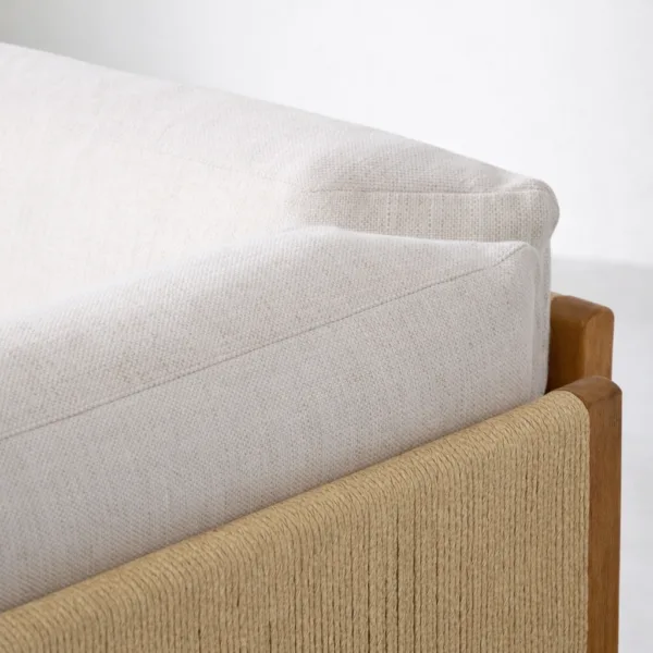 Woven rope side panel and teak wood frame detail on outdoor l shaped sofa