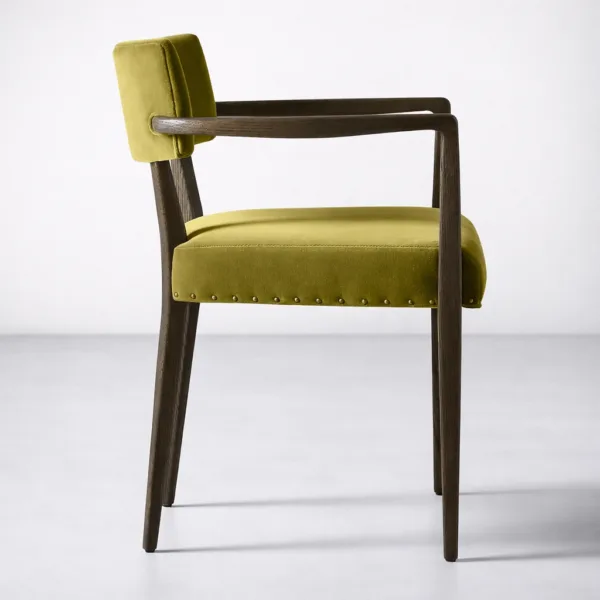 INTERIORZE Avelon teakwood upholstered dining chair with arms side view in olive green fabric