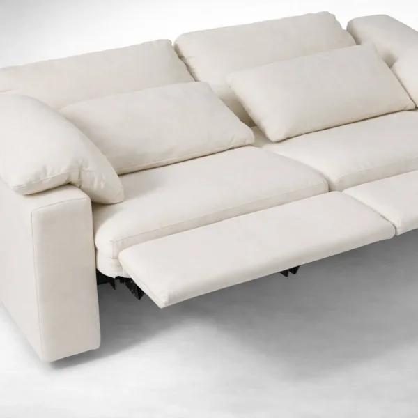 Close-up of footrest extension on 2 seater motorized recliner sofa in pearl white fabric