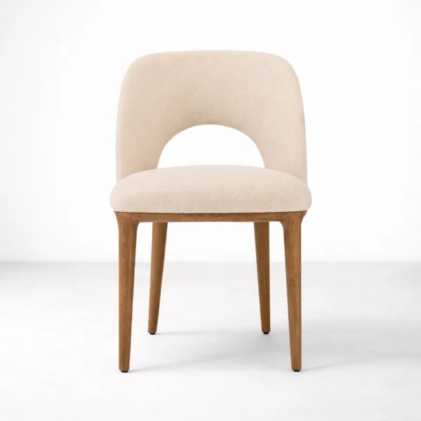 Upholstered teakwood dining chair front view cream fabric seat and back cut-out design