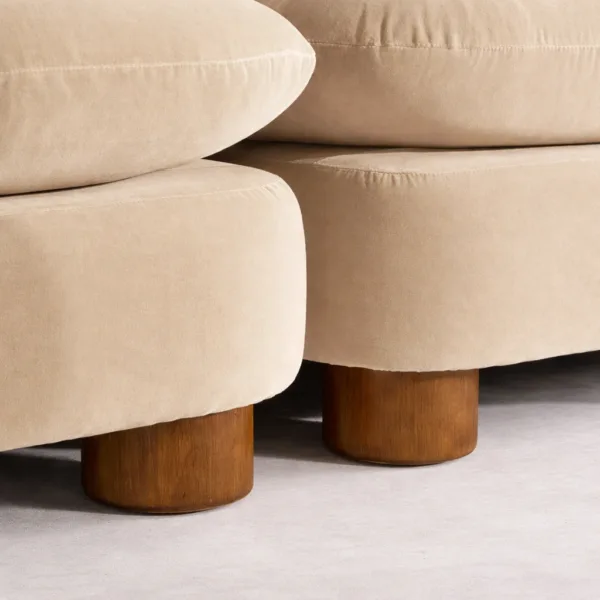 Teakwood legs detail of Arcura 2 seater teakwood sofa in ivory upholstery