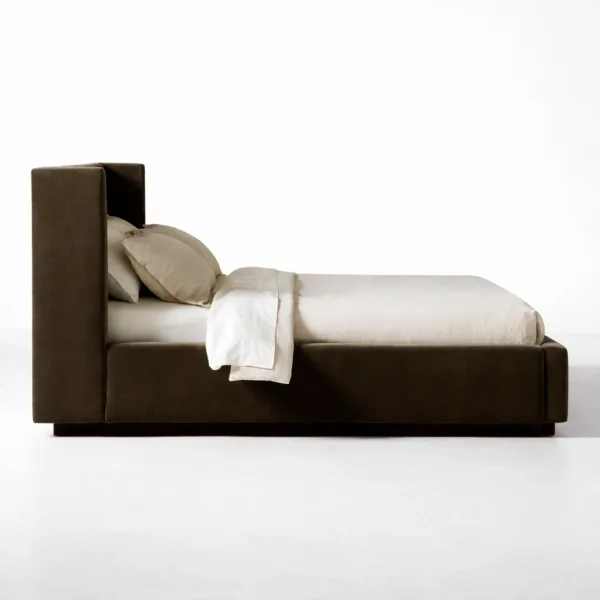 Side view of INTERIORZE Auren teakwood upholstered storage bed in dark brown upholstery