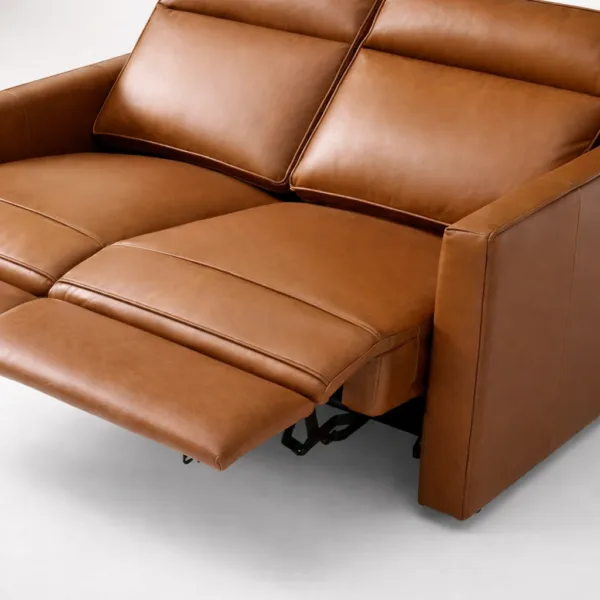Cognac leather-look upholstery close-up on INTERIORZE 2 seater power recliner sofa