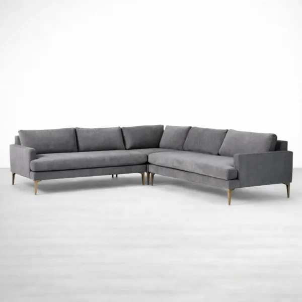 Charcoal grey L shape sectional sofa with brass legs by INTERIORZE