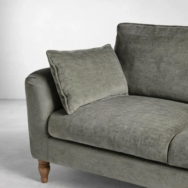 Olive green sofa fabric texture and cushion detail close-up by INTERIORZE