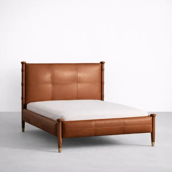 Teakwood leather bed in saddle brown with tapered legs angled view