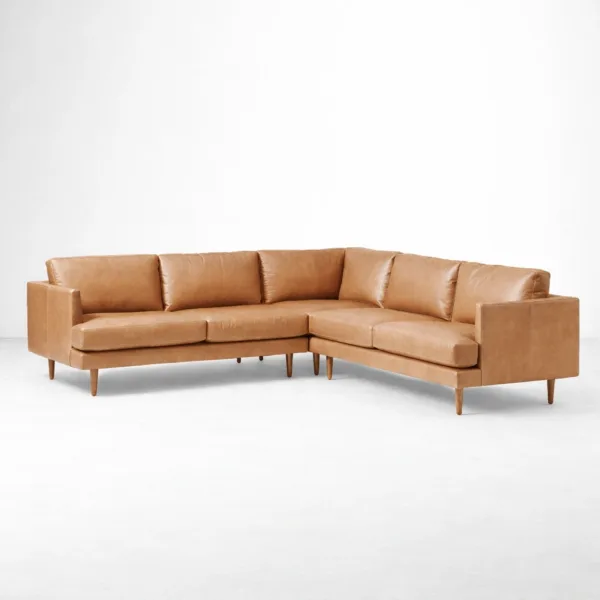 Tan leather L shaped sectional sofa for living room in modern style by INTERIORZE