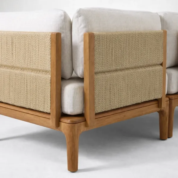 Woven rope side panel and teak wood legs detail on outdoor l shaped sofa