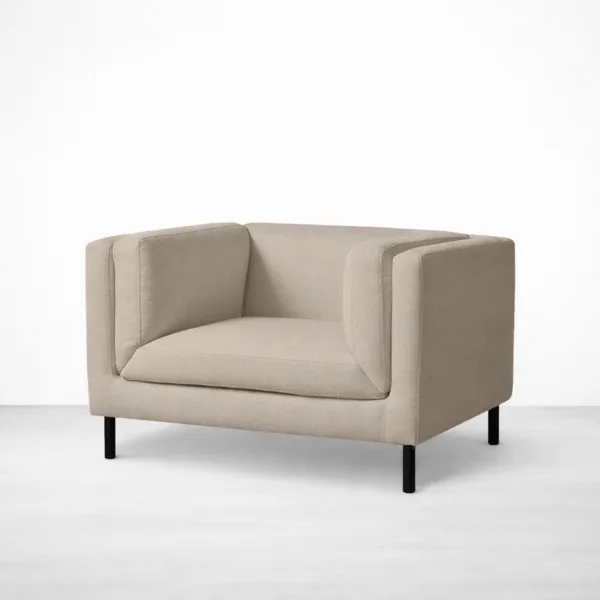 Beige accent chair with teakwood legs angled view, INTERIORZE DUNE.