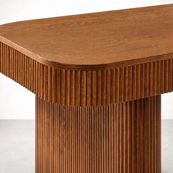 Corner detail of INTERIORZE Rillan fluted teakwood dining table with ribbed apron