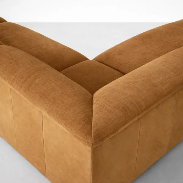 Tan Sectional Sofa Armrest Close Up